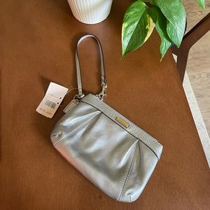 New with tags. Coach Metallic Wristlet